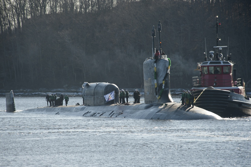 USS North Dakota, a Virginia-class submarine, with a Dry Deck Shelter fitted behind the ship’s sail. The DDS is used to store Seal Delivery Vehicles such as the Mark IX.